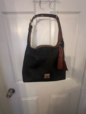 Dooney & Bourke Black Leather Shoulder Bag with Brown Trim and Tassel
